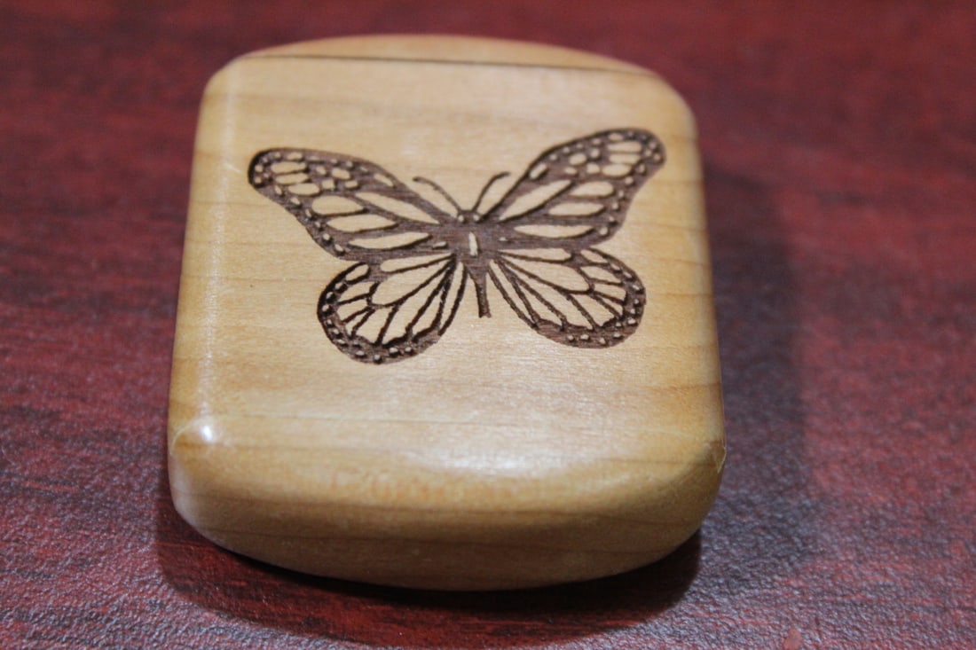 An Inlaid Wooden Slide Trinket Box: 2" across