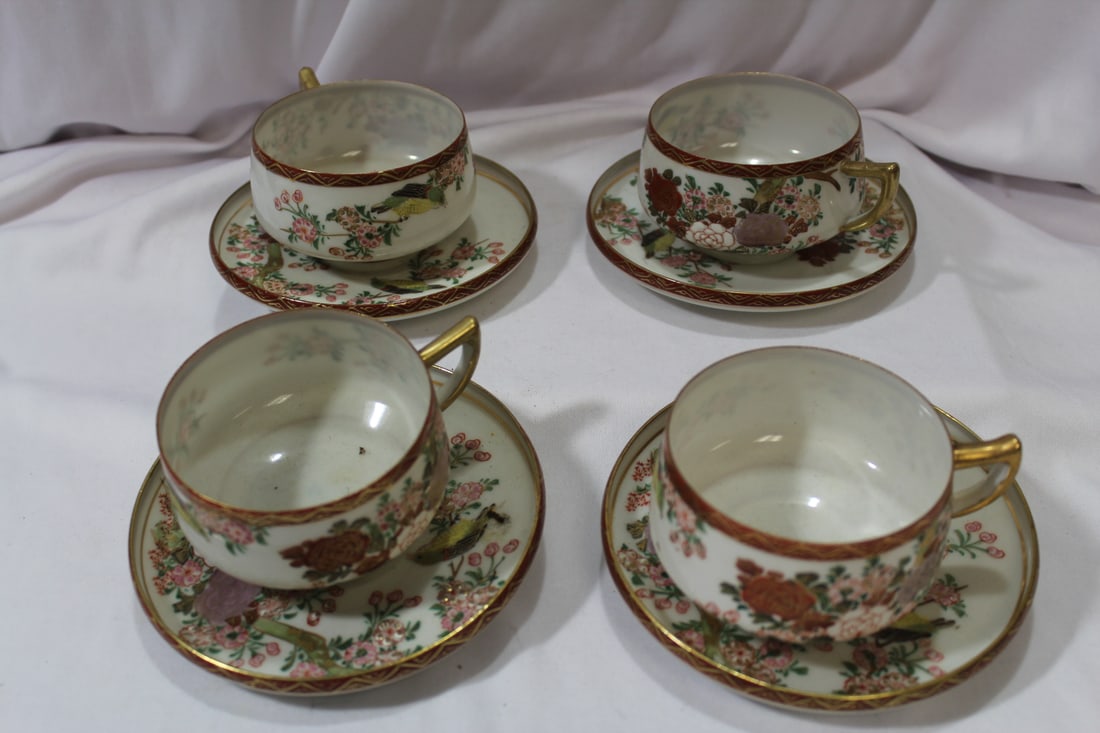 A Set of 4 Kutani Cup and Saucer: signed - thinly carved - cup= 2 1/8" tall