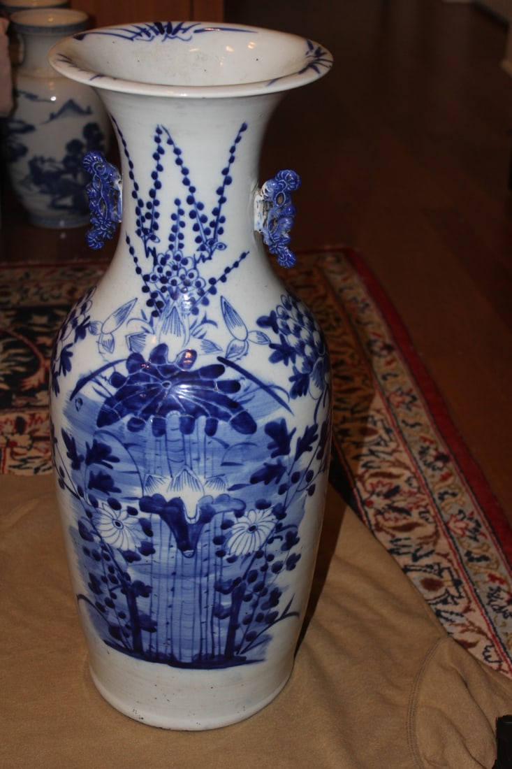 Antique Chinese Flow Blue Vase: 19th century - blue and white - 23" tall by 9" wide - please note: underchip and faint hairline on bottom as shown