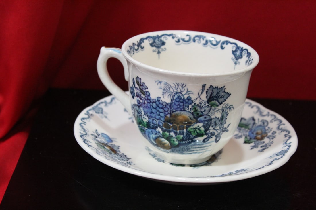 A Mason Fruit Basket Cup and Saucer: 2 7/8" tall