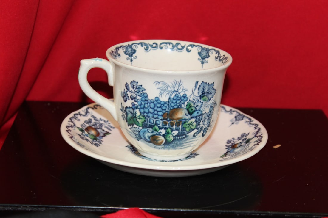 A Mason Fruit Basket Cup and Saucer: 2 7/8" tall