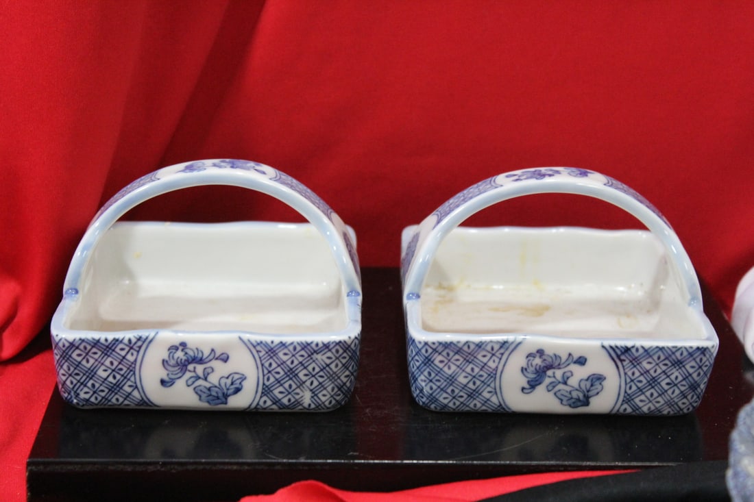 A Pair of Oriental Style Blue and White Baskets: 5 inches across