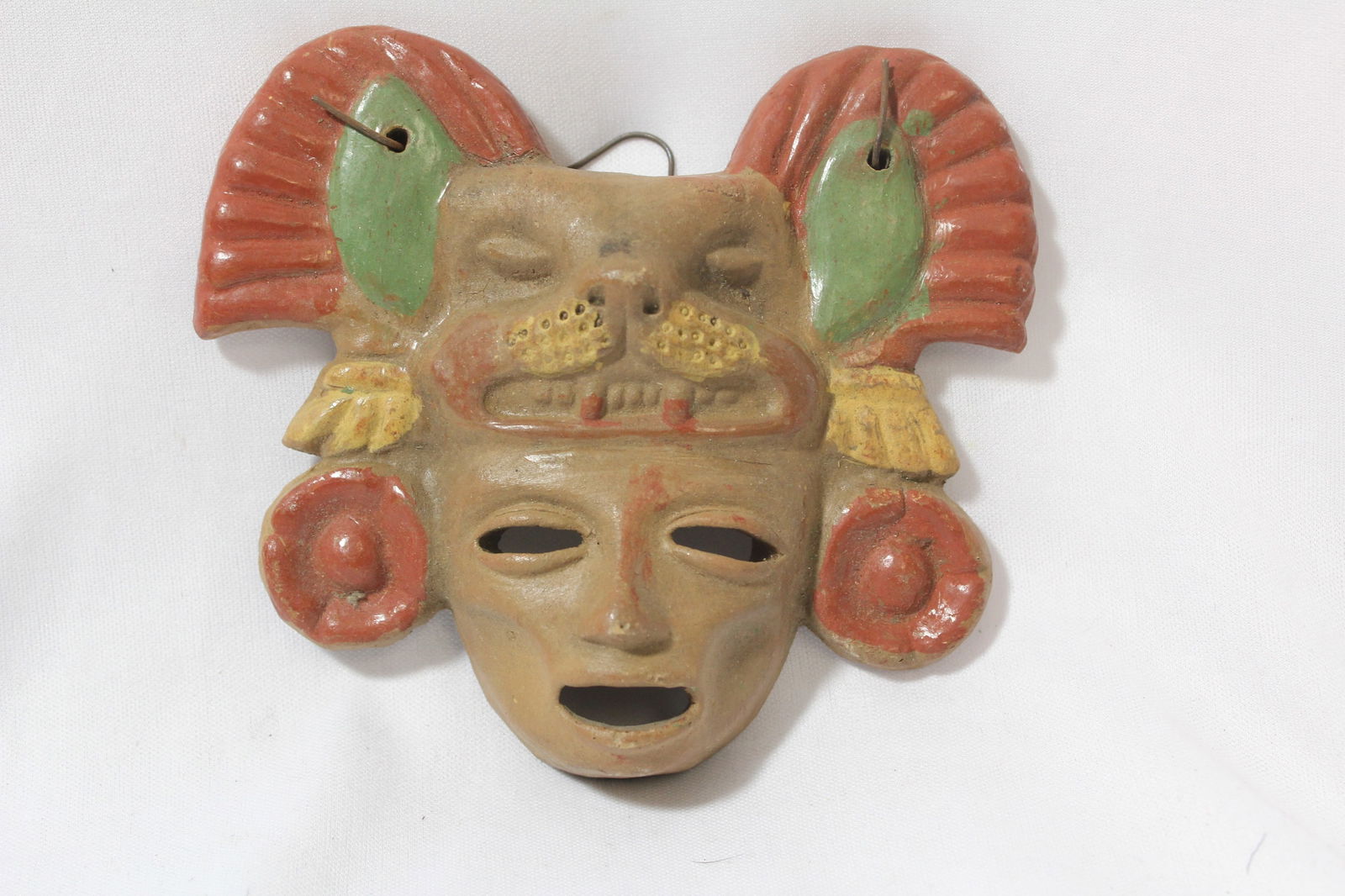 A Vintage Clay Mask Wall Hanger: 5 1/4" across