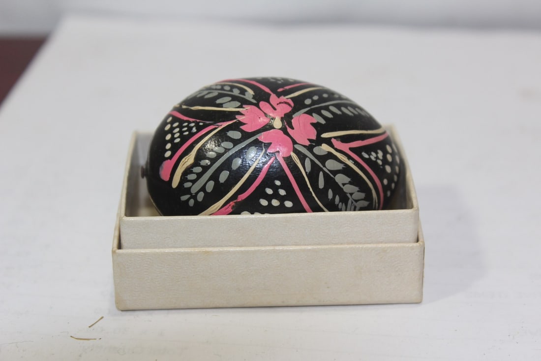 A Hand Painted Wooden Egg: 2 1/4" across
