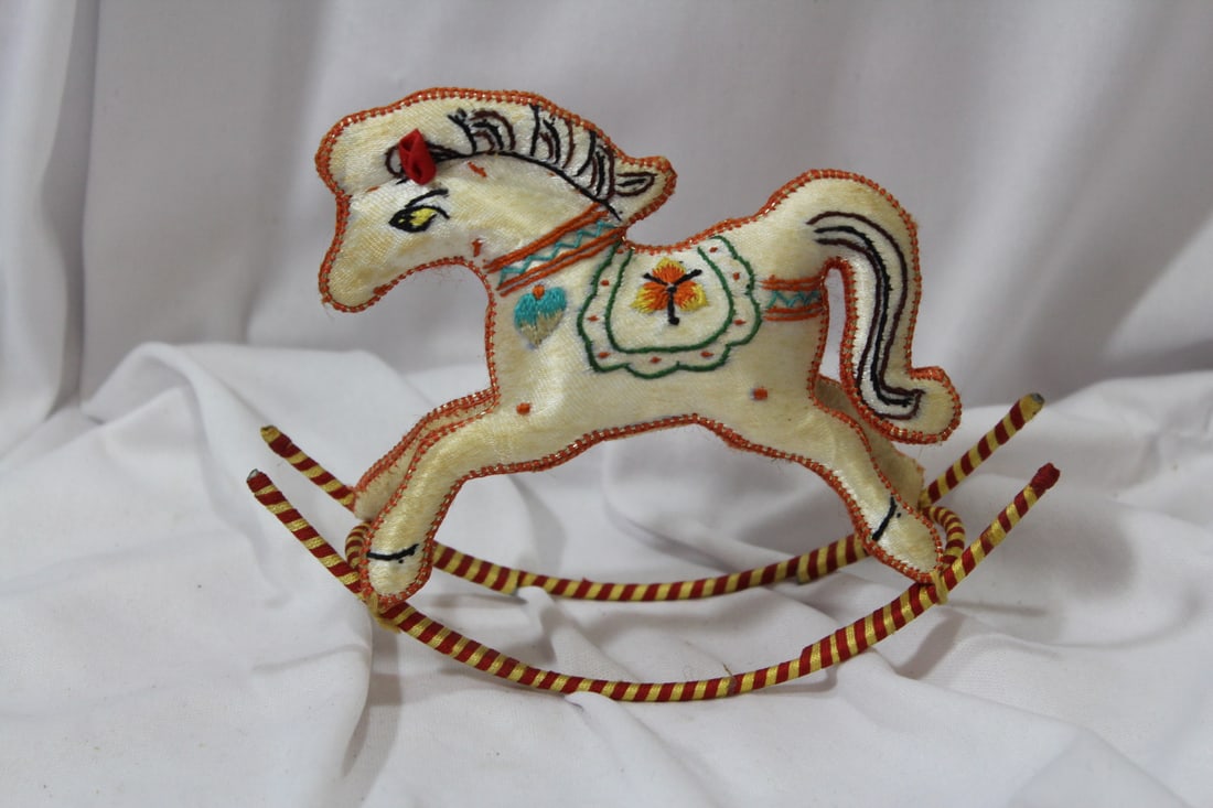 A Silk Rocking Horse: 5 3/8" across