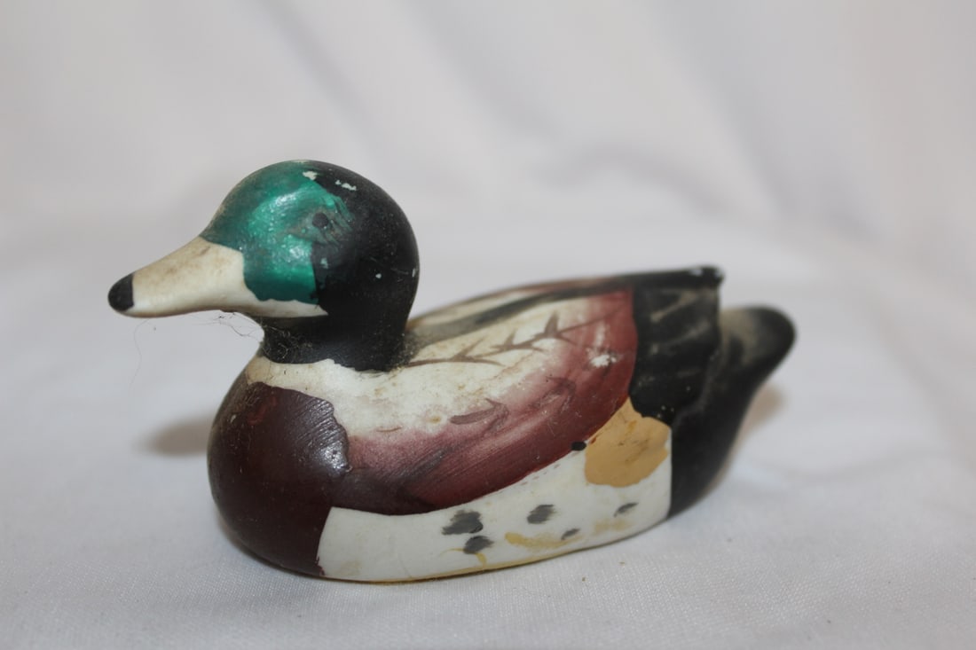 A Ceramic Duck: 4" across