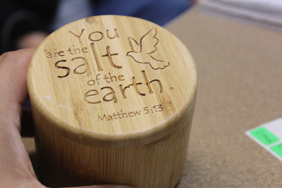 A Wooden Sliding Box: 2 3/4" tall by 3 1/2" wide - signed on the bottom