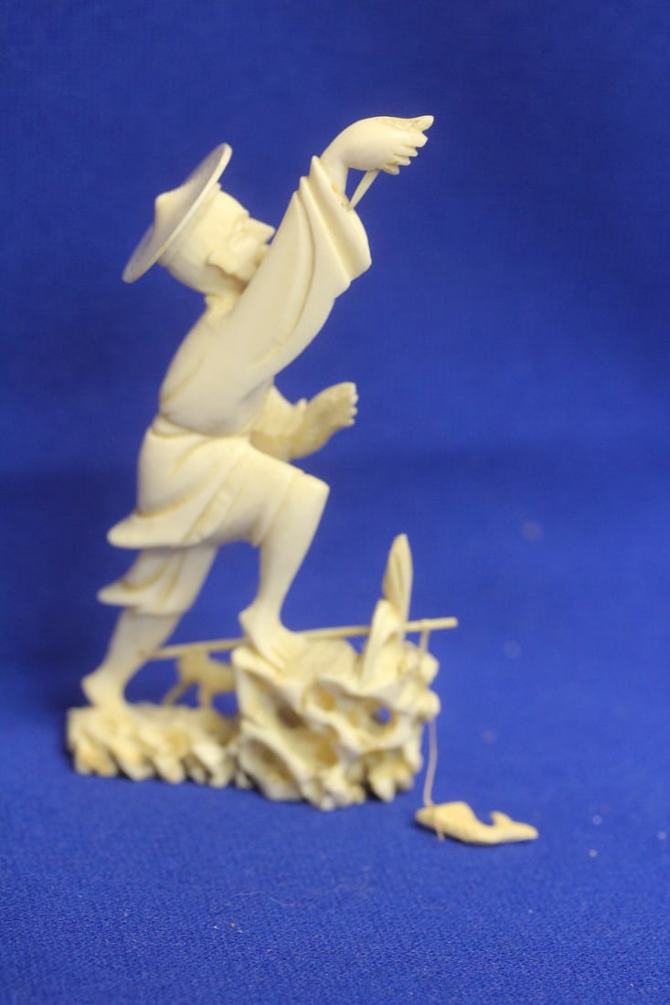A Carved Chinese Fisherman: please note: fishing pole broke off - 4 1/4" tall