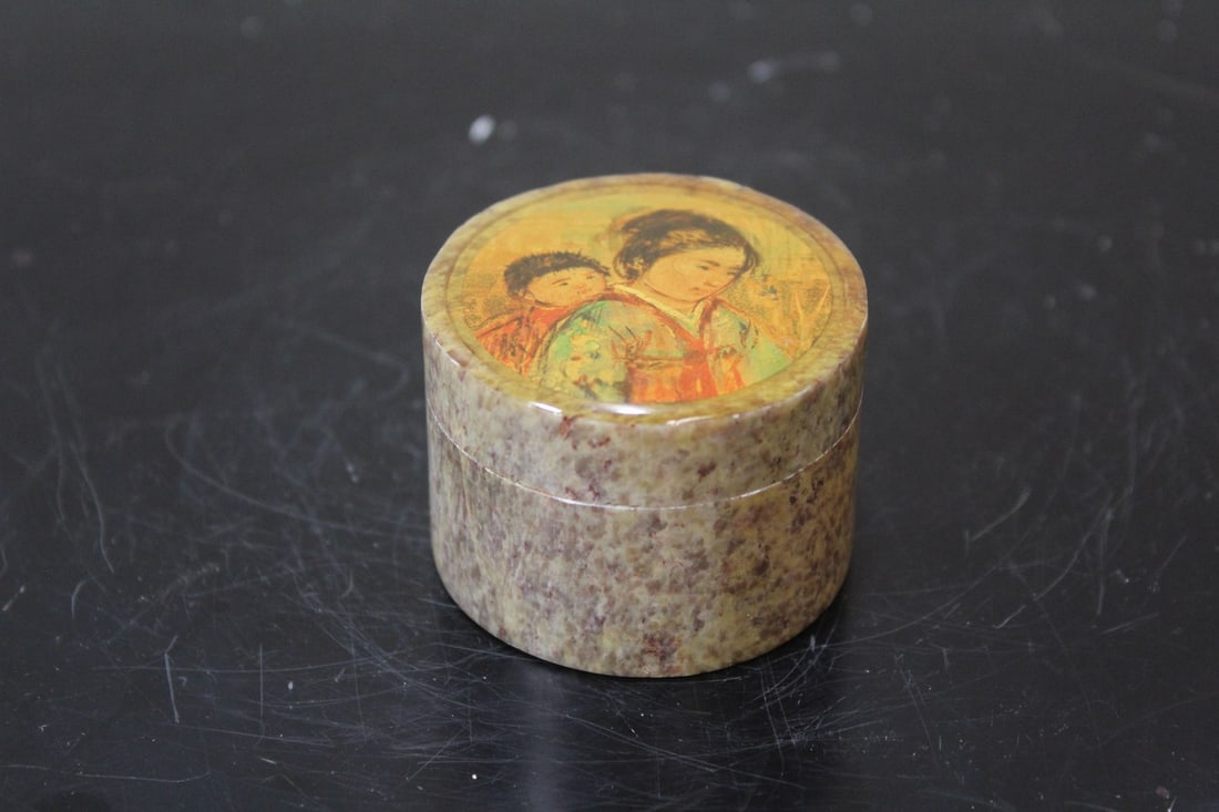 An Edna Hibel Stone Trinket Box: 1 1/2" tall