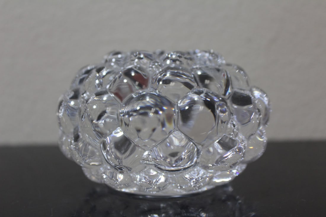 An Orrefors Candlestick: 4 1/2" in diameter