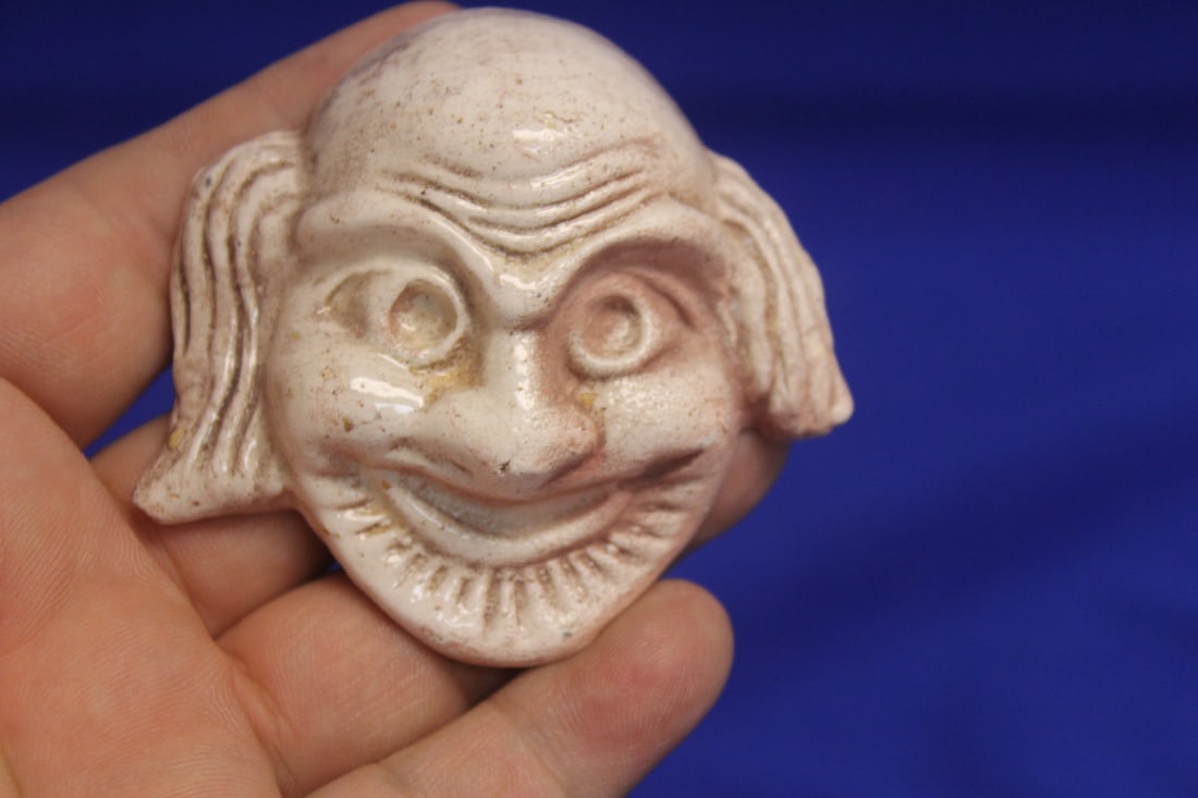 A Small Ceramic Face: 2 1/2" across