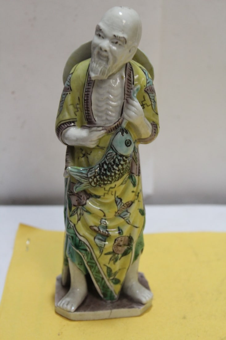 A Chinese Famille Juane Fisherman Figure: late 19th to early 20th century - please note: loss on the beard as shown - 6 5/8" tall - artist signed - marked "China"