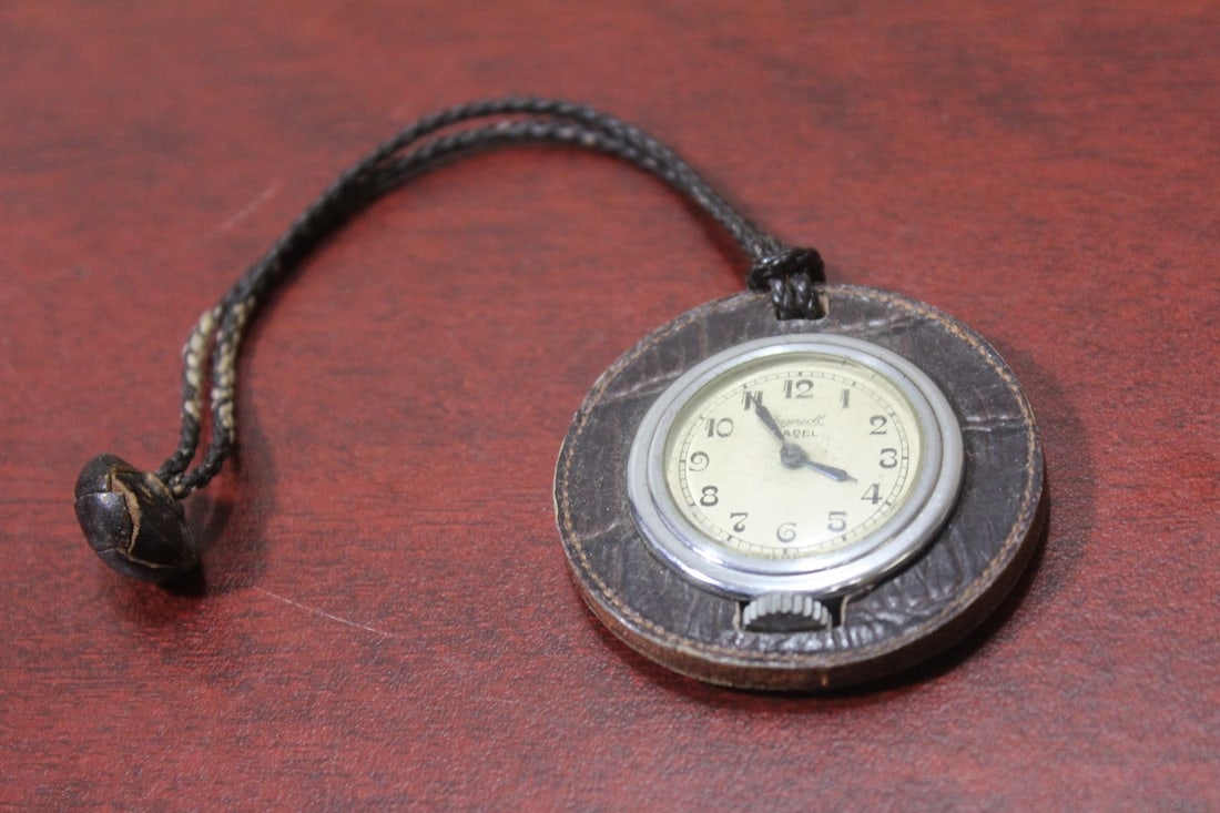 A Rare Ingersoll Lapel Pocket Watch: currently working