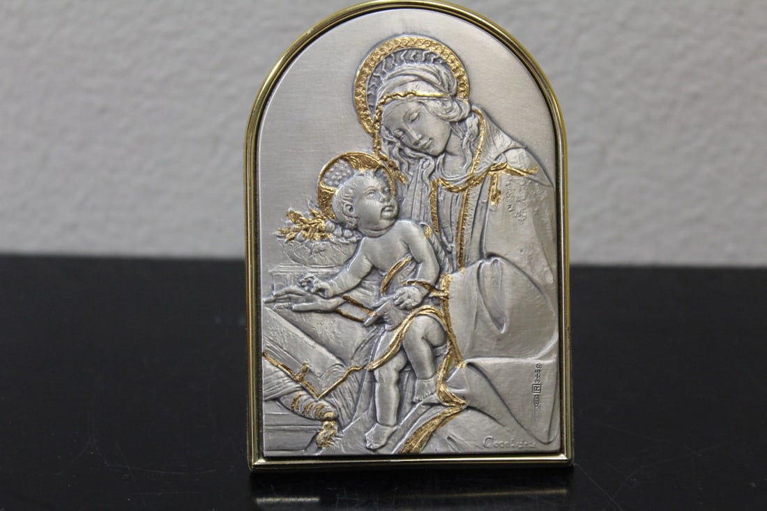 A Sterling Icon: 3 3/4" tall