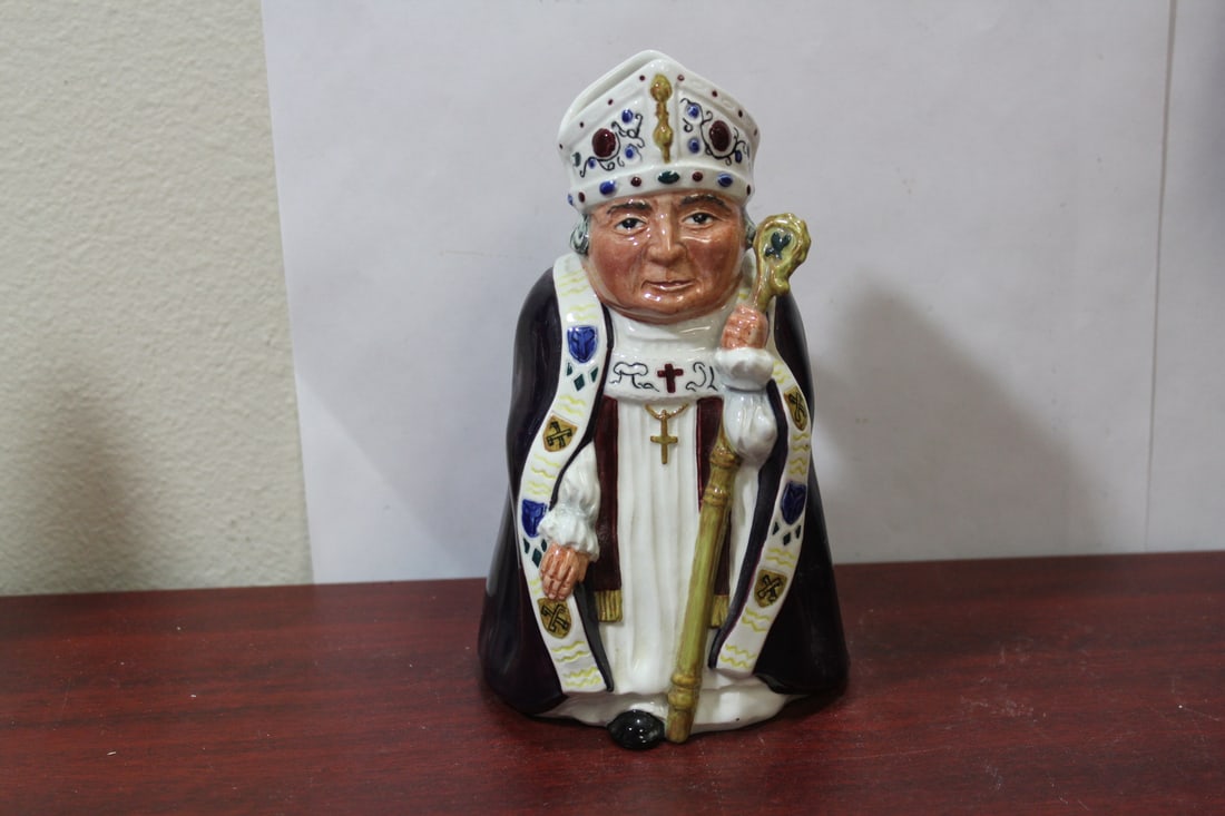 A Staffordshire Archbishop Cup/Mug: 7 1/2" tall
