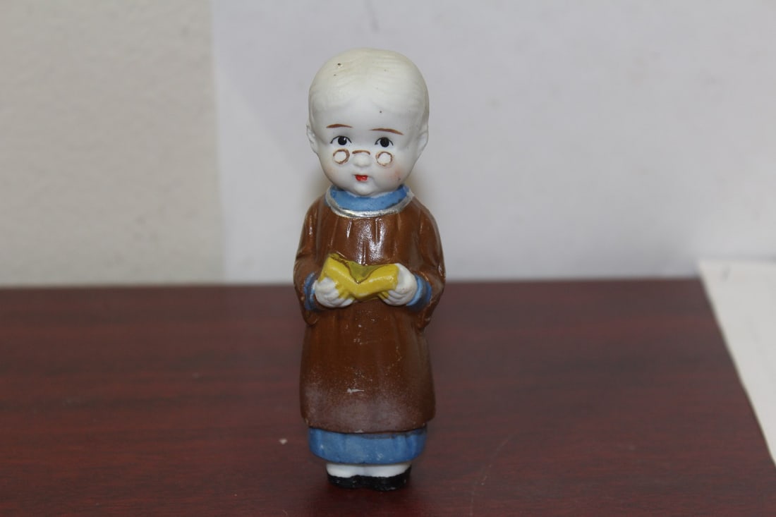 A Japanese Ceramic Figurine (1 of 7)