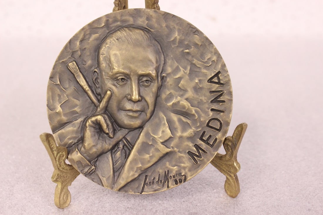 A Bronze Plaque: 3 1/2" in diameter