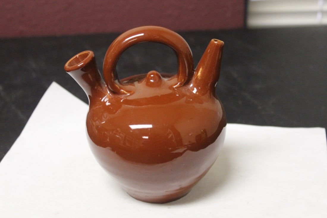A A Spanish Water Vessel - Botijo: signed on the bottom - 6" tall