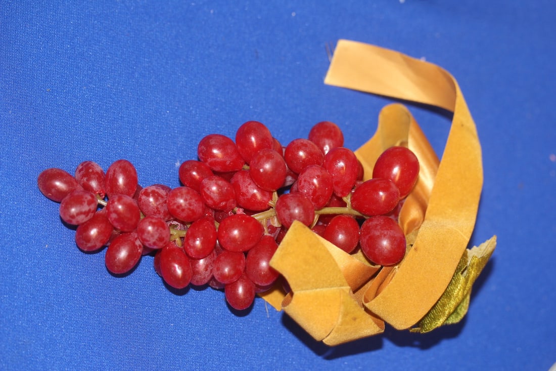 A Vintage Decorative Plastic Grape: 9 inches long