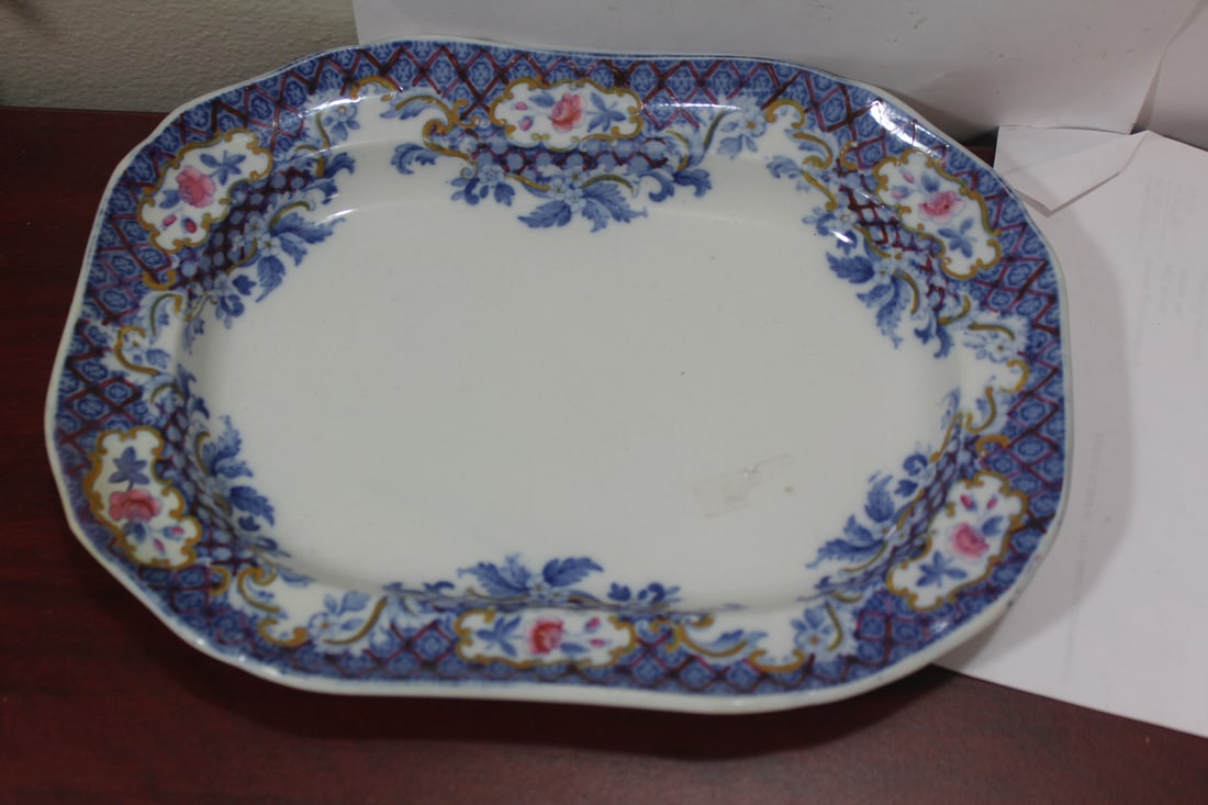 A Copeland Ceramic Undertray: please note: old restoration - 12 1/2" in diameter