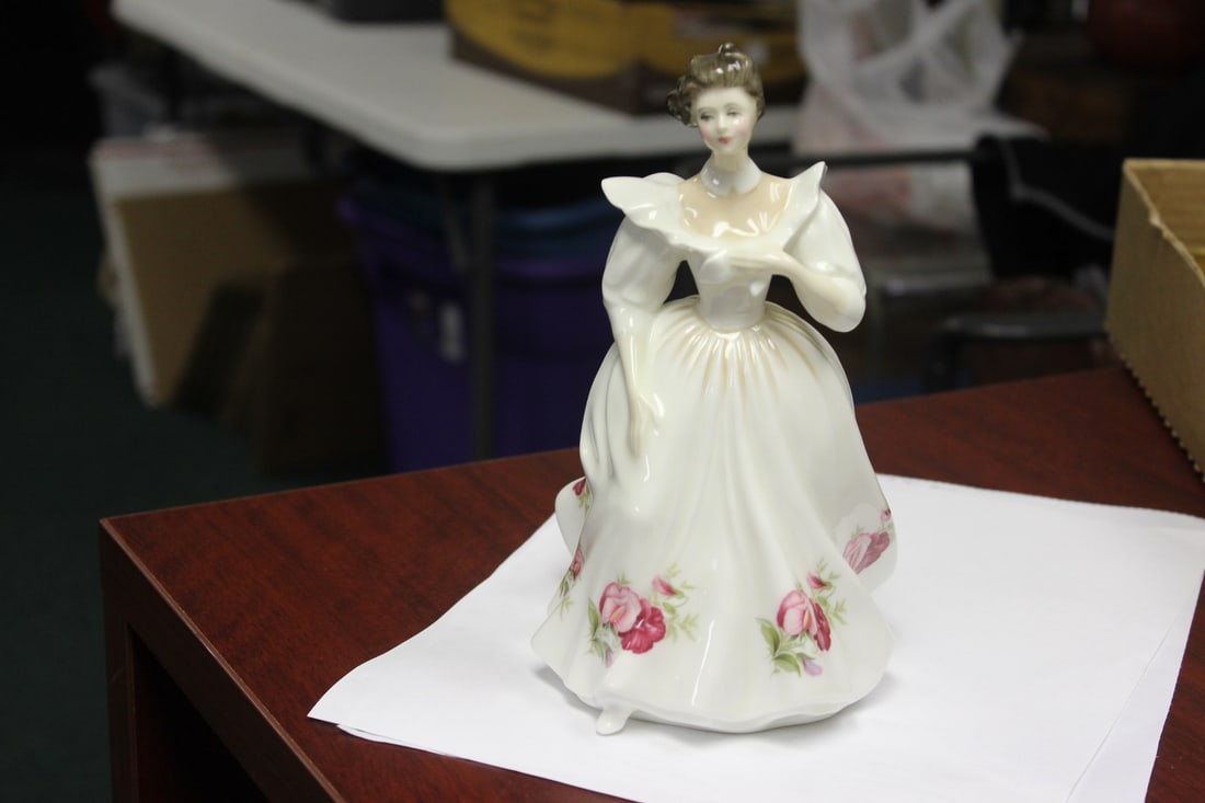 A Hand Signed Royal Doulton Figurine- "April": 8 1/4" tall