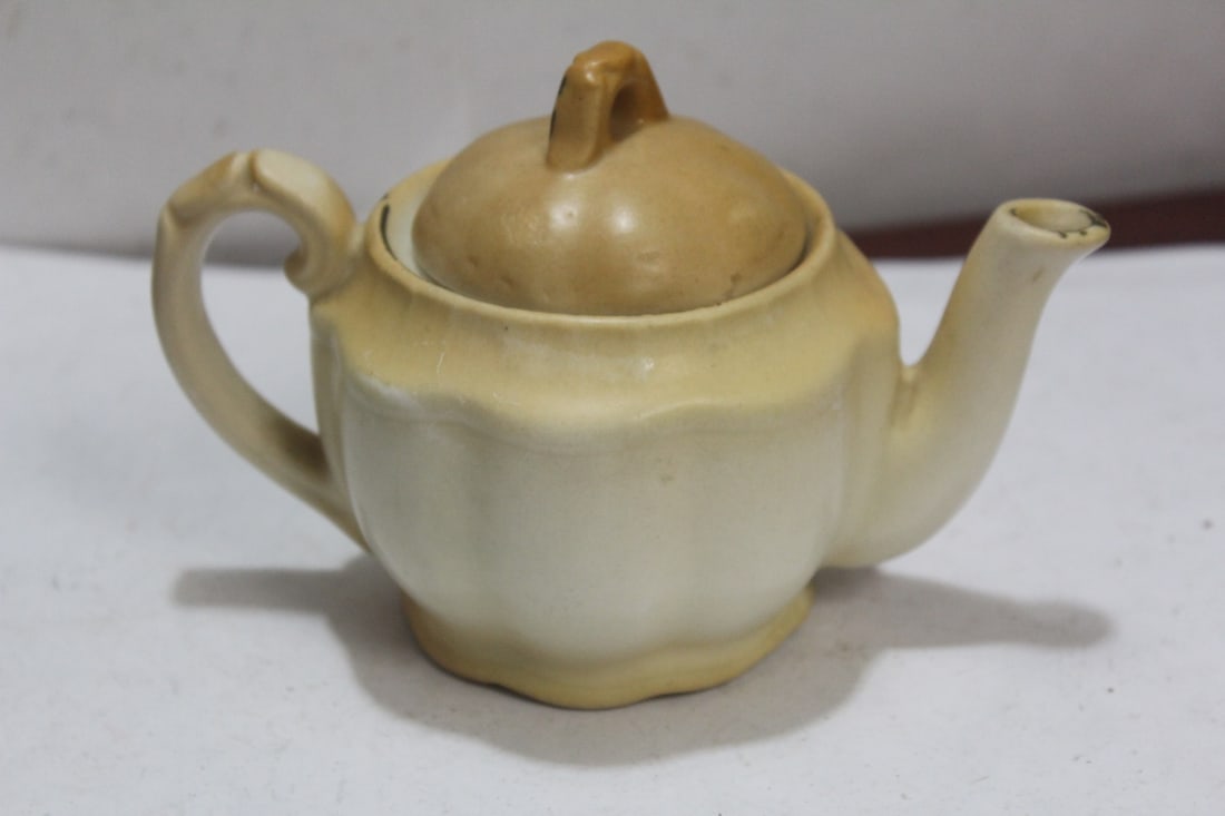 A Small Ceramic Teapot - 2
