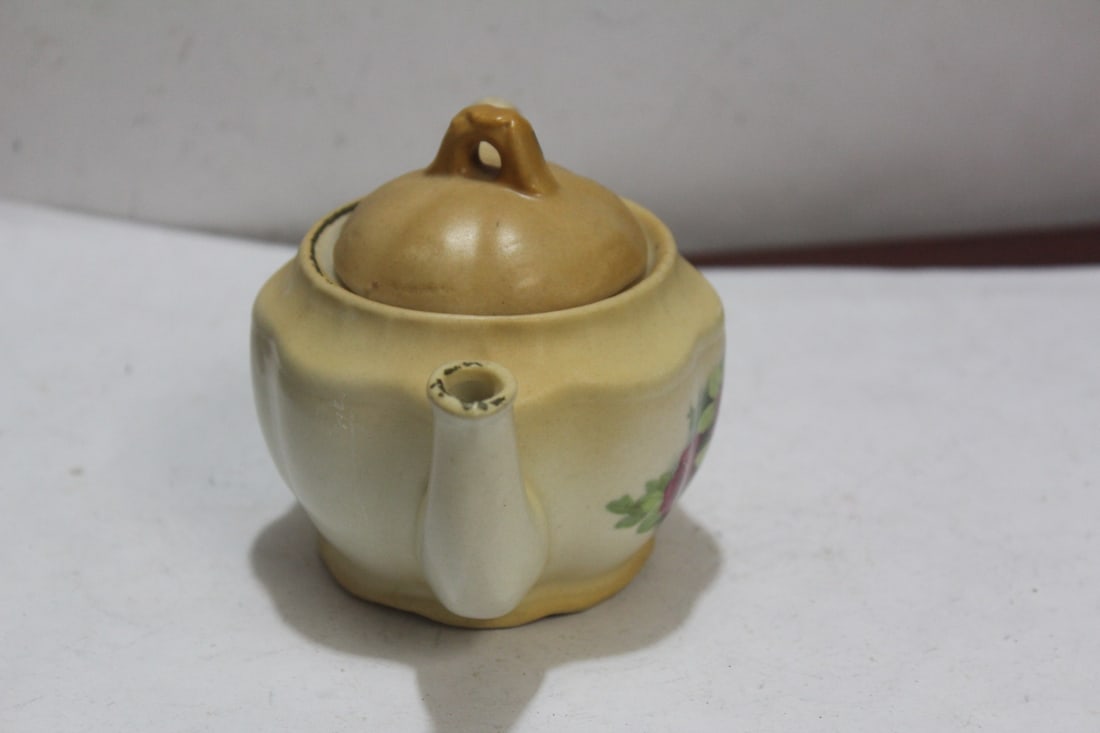 A Small Ceramic Teapot - 3