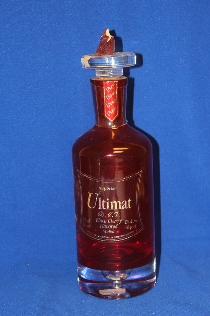 A Ruby Red Artglass Decanter: 11" tall