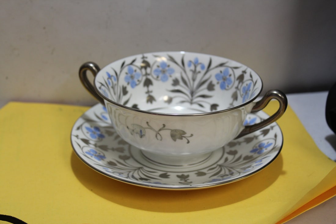 A Wedgwood Soup Bowl and Saucer/Underplate: bowl= 5" in diameter without the handle