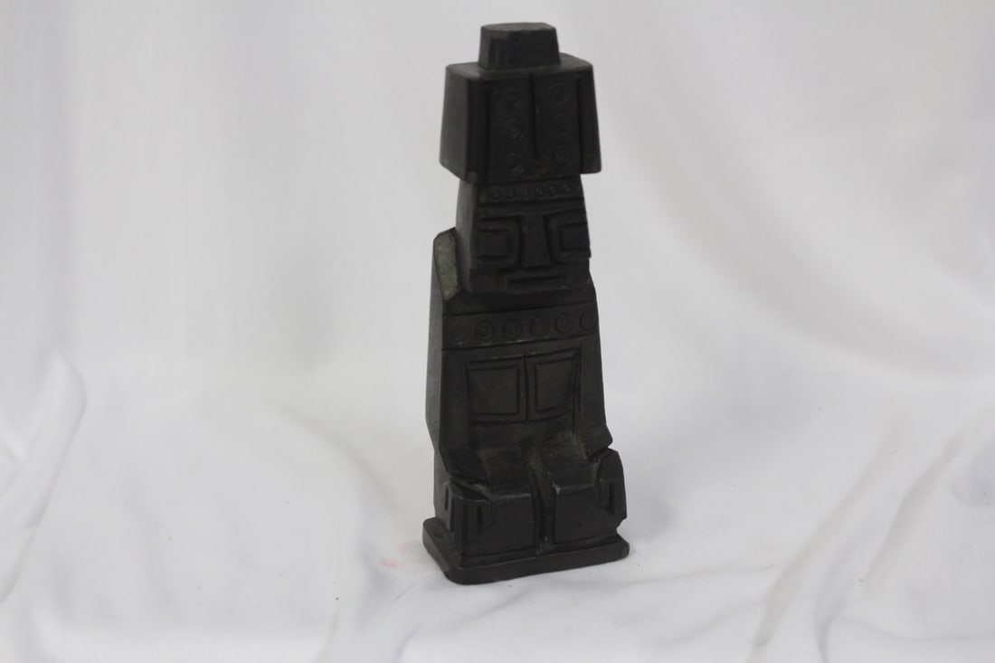 A Ceramic Statue: please note: btoom chip - 6" tall