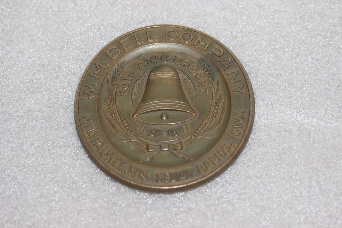 A Bronze Medal: 3 1/2" in diameter