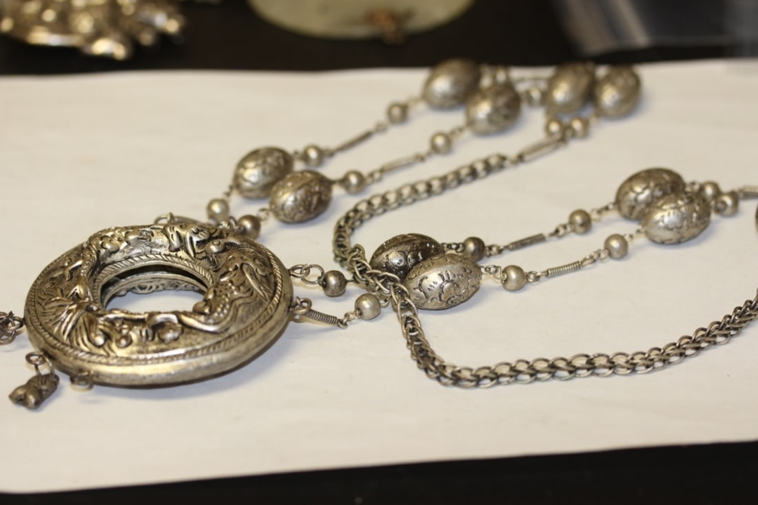 A Chinese/Asian Necklace: missing one charm as shown