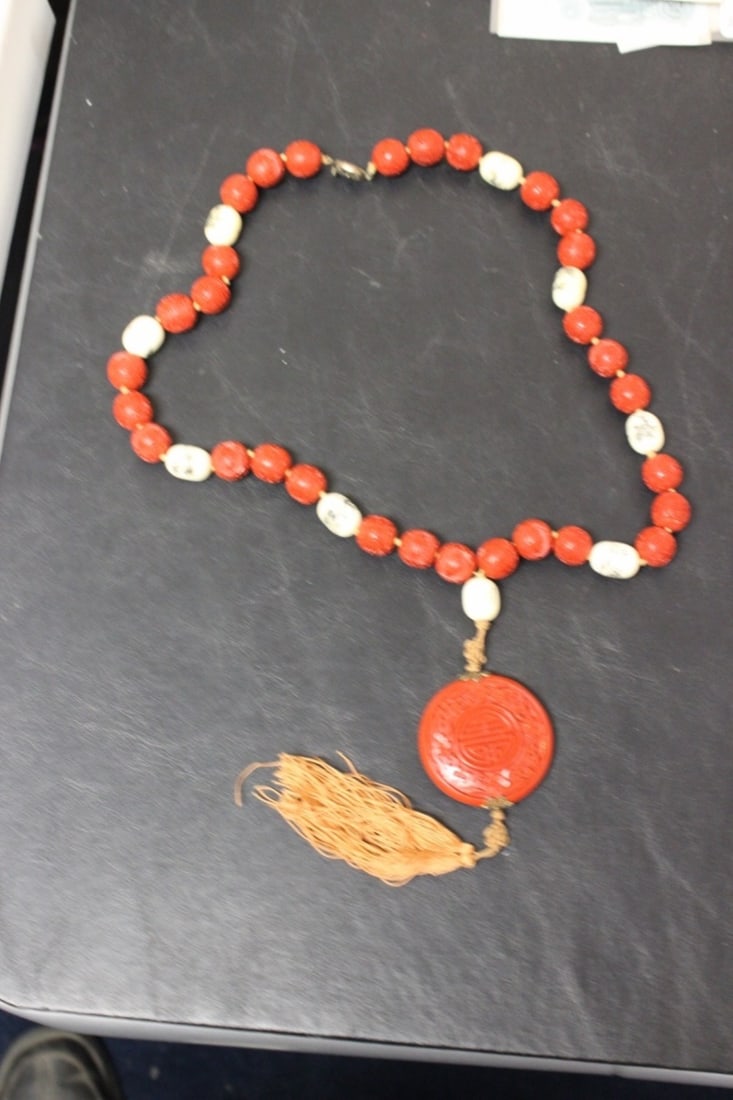 A Cinnabar and Bone Necklace: probably 1940's - chinese