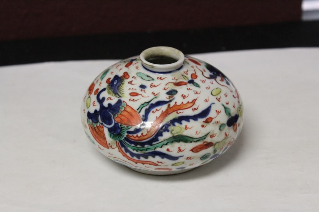 An Old Chinese Dragon and Phoenix Washer - Signed: please note: restoration. Was broken at one time and glued back - 4" in diameter