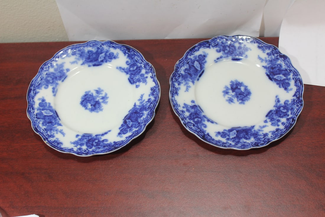 A Pair of Burslem Flow Blue Bread Plates: 7 inches in diameter each