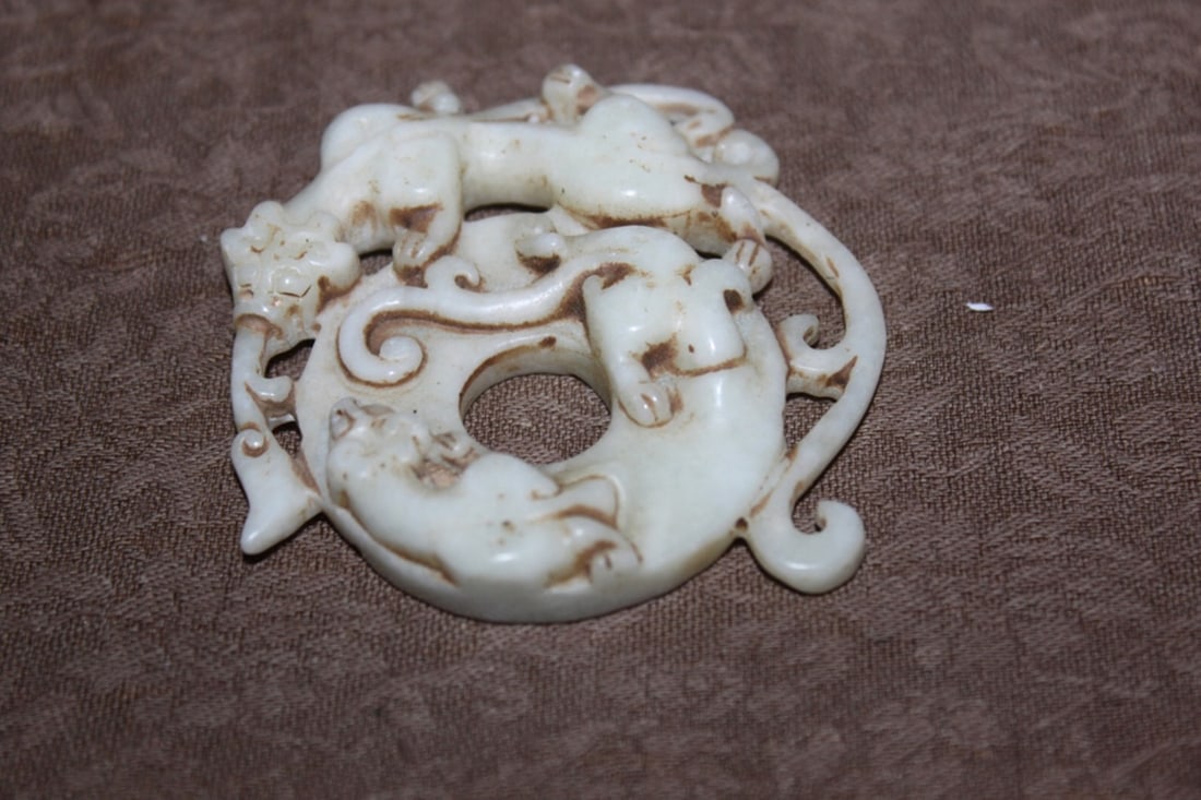 Jade Circular Disc: 2 3/8" in diameter.