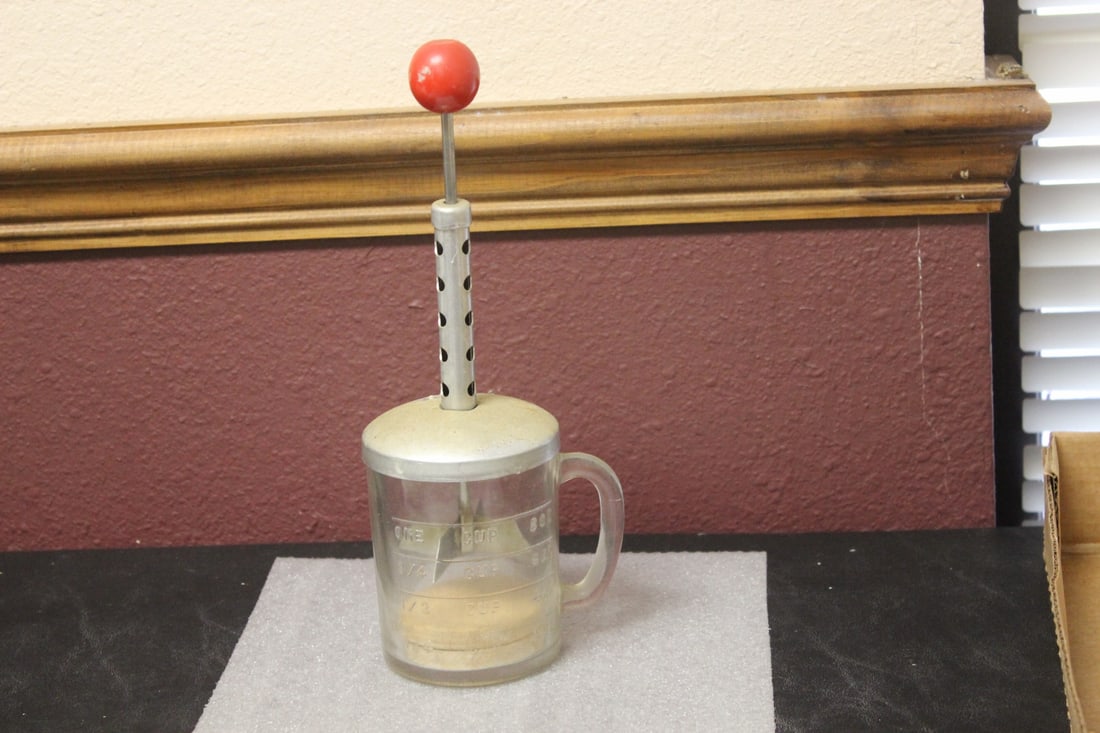A Vegetable Chopper: 10 1/2" tall