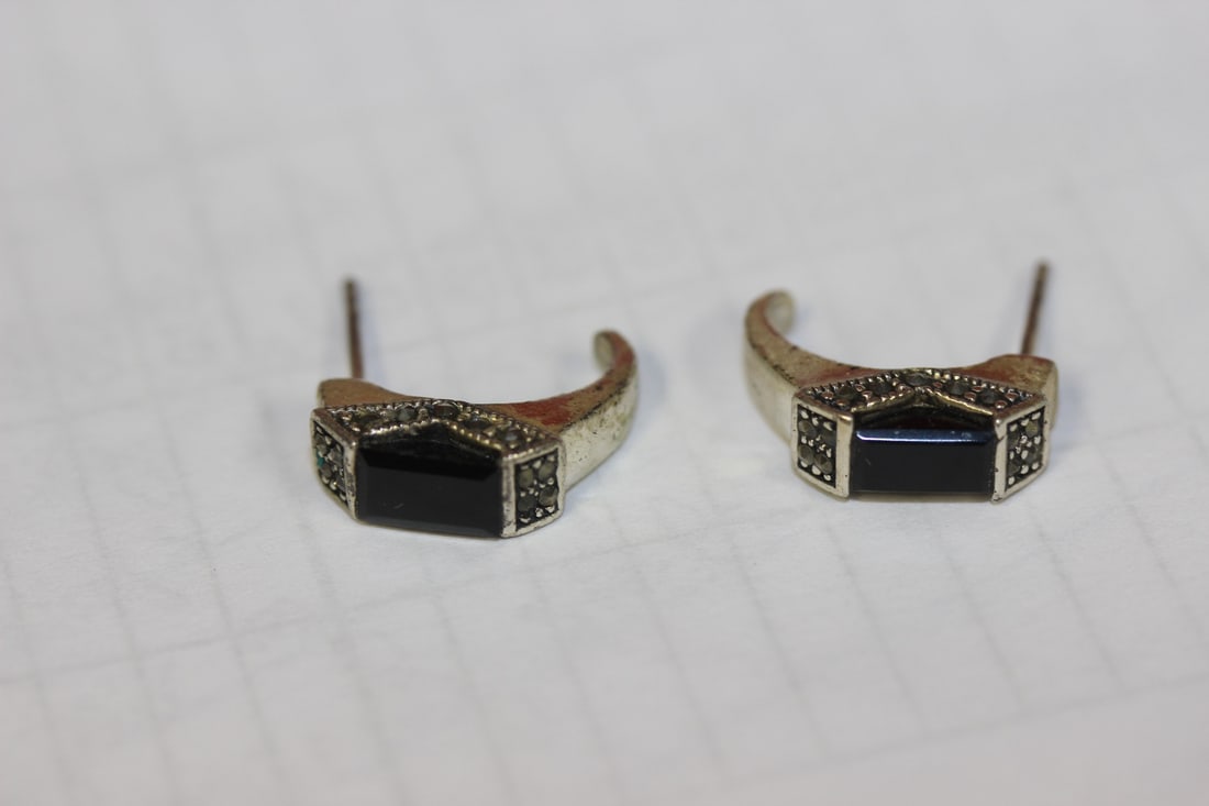 A Pair of Sterling Earrings: as shown