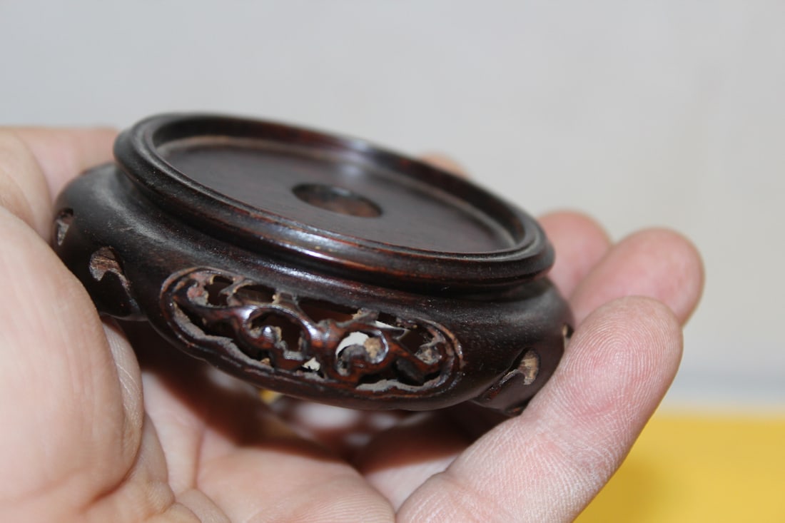 A Small Carved Woodstand: 19th century - marked "China" - inside diameter= 2"