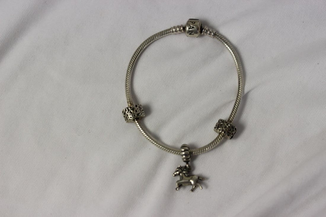 A Pandora Sterling Bracelet: as shown