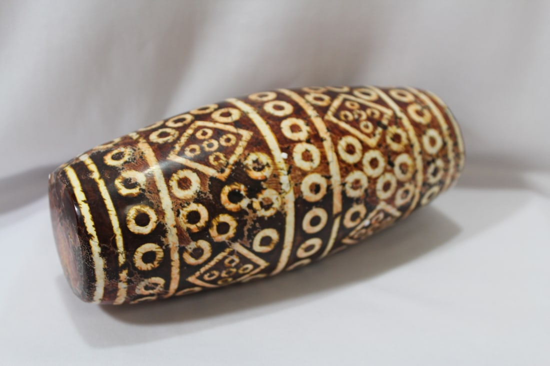 A Huge Dzi Bead: solid - 7 3/4" tall x approximately 3 1/4" wide