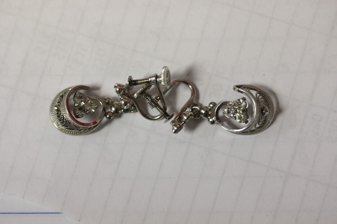 A Pair of Sterling Earrings: as shown