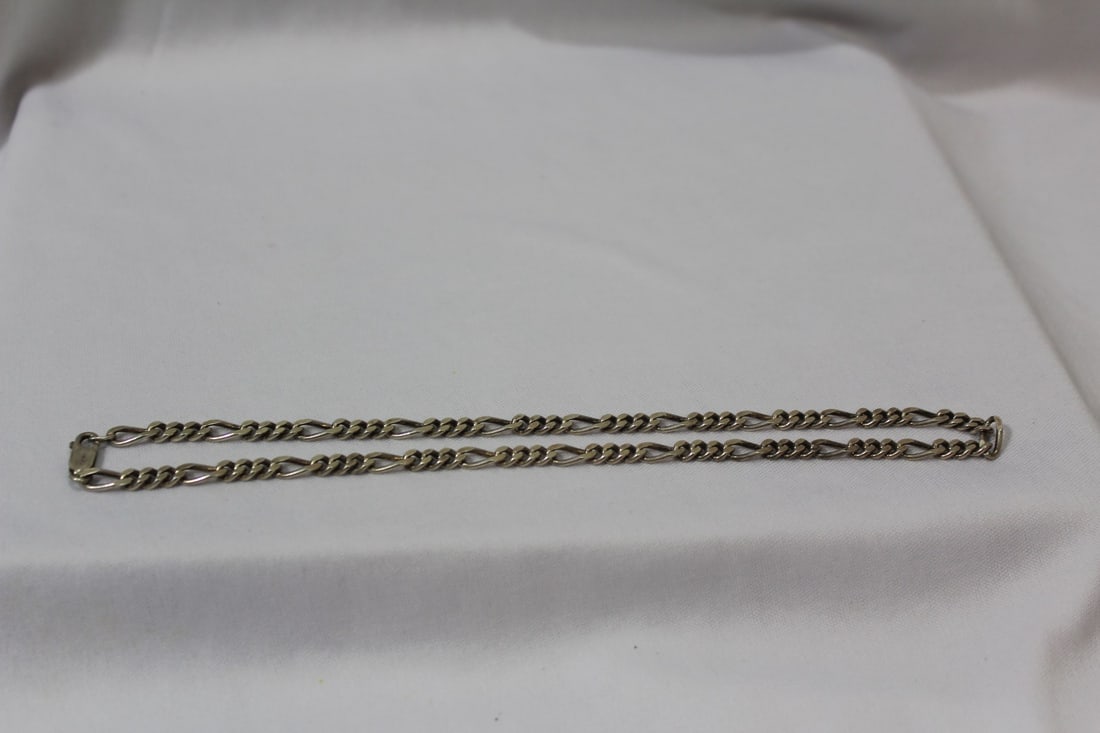 A Diamond Cut Sterling Cut Necklace: 17 1/8" long unclasped