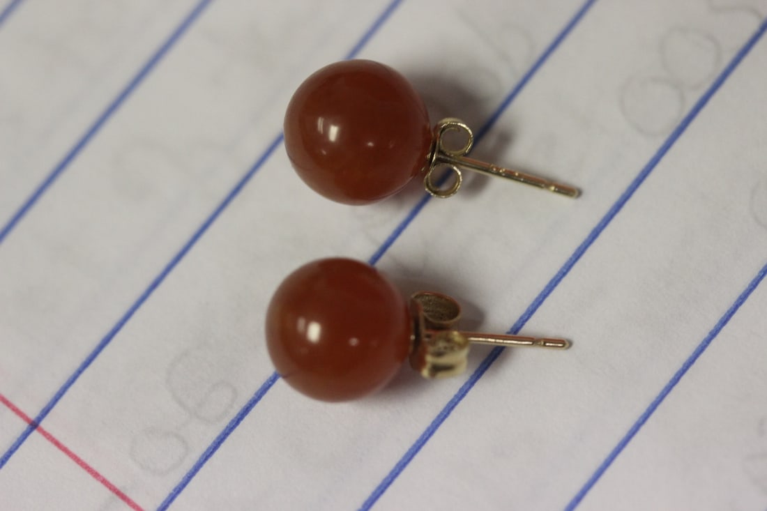 A Pair of 14 Karat Gold Earrings: as shown