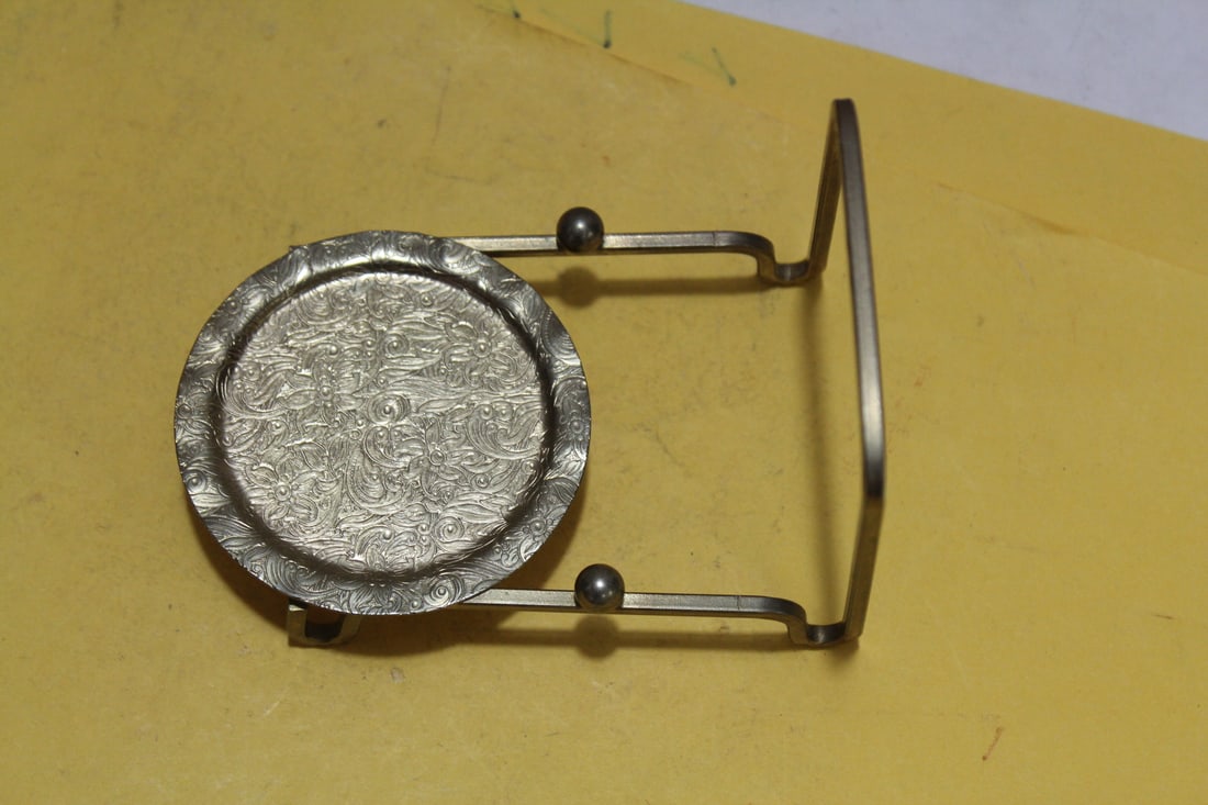 A Metal Holder: 4 1/4" long
