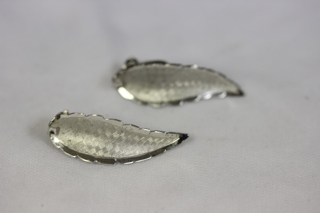 A Pair of Sterling Earrings: as shown
