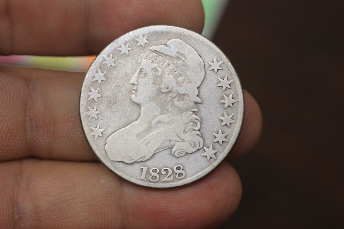 An 1828 Half Dollar: as shown