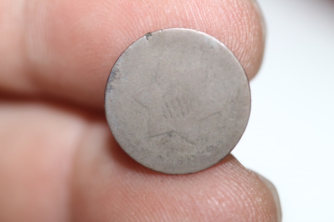 A Cull Silver 3 Cent Piece: as shown