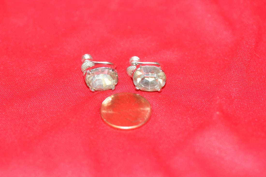 A Pair of Sterling Earrings: as shown