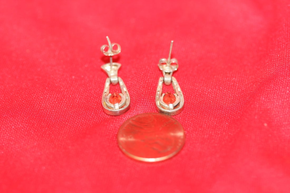 A Pair of Sterling Earrings: as shown